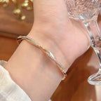 Micro Paved CZ Mobius Twist Bangle